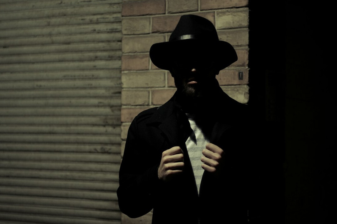store detective catching thief